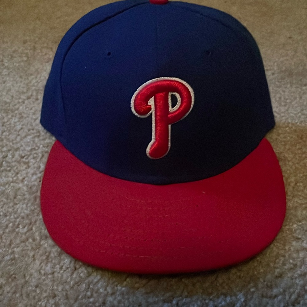 Blue and red Phillies hat